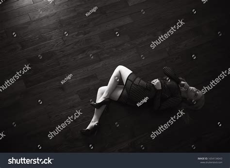 Sexy Model Lying On Wooden Floor Stock Photo 1654134043 Shutterstock