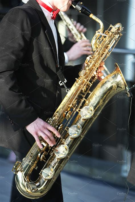 A Man Playing A Saxophone High Quality Arts And Entertainment Stock