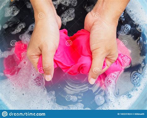 We all know that cold water isn't effective when it comes to stain removal, unlike the warmer temperatures. Wash Color Clothes With Hand And Soak Cloth In Laundry ...