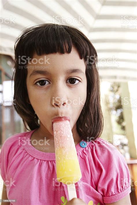 Cute Six Year Old African Girl Sucking Popsicle Stock Photo IStock