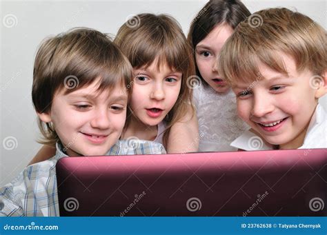 Group Of Children Friends Playing Computer Games Stock Photo Image Of