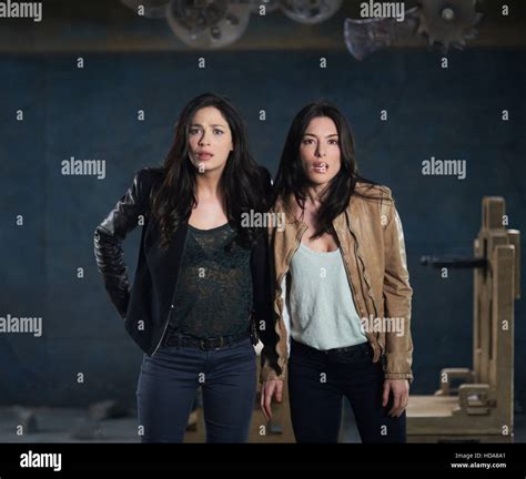 Warehouse 13 From Left Joanne Kelly Jaime Murray Stand Season 3 Ep 312 Aired Oct 3