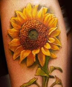 Red flower symbolize a burning passion, while white flower design symbolizes purity. Sunflower Tattoo Meaning and Symbolism