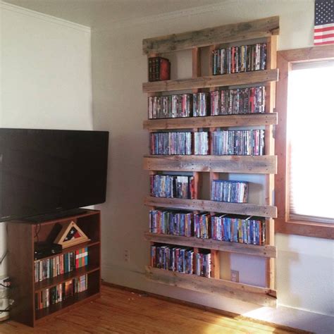 Ideas and plans for dvd wall shelves mounted with brackets. DIY Pallet DVD Shelf (With images) | Dvd shelves, Shelves, Pallet diy