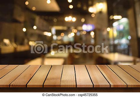Wood Table Top On Blur Bokeh Cafe Background Can Be Used For Display Or