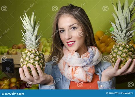 Closeup Of Beautiful Young Woman Holding Pineapples Stock Image Image Of Loosing Fruit 54681559