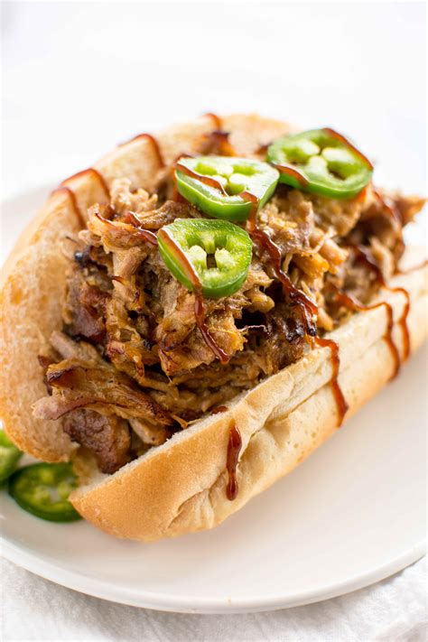 The typical pulled pork sandwich is piled on buns and served with coleslaw (on the pork or on the side), extra barbecue sauce, dill pickle slices, and your favorite side dishes. Slow Cooker Honey Mustard Pulled Pork - Slow Cooker Gourmet