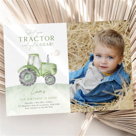 A Little Boy Is Sitting In Hay With His Farm Tractor Birthday Card On