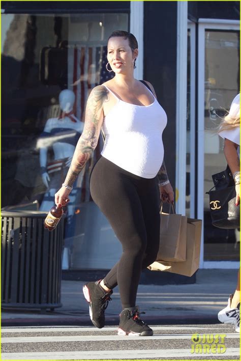 Amber Rose Shows Off Major Baby Bump While Shopping Photo