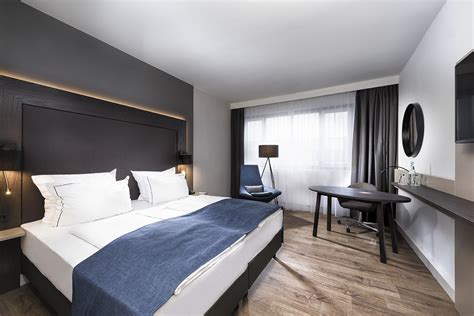 Wifi is free, and this hotel also features an indoor pool and a restaurant. 4-star Hotel Rooms in Berlin | Holiday Inn Berlin City-West