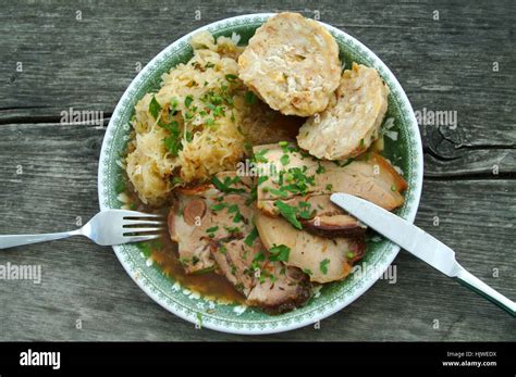 Austrian Plain Fare Roast Pork With Bread Dumpling And Sauerkraut
