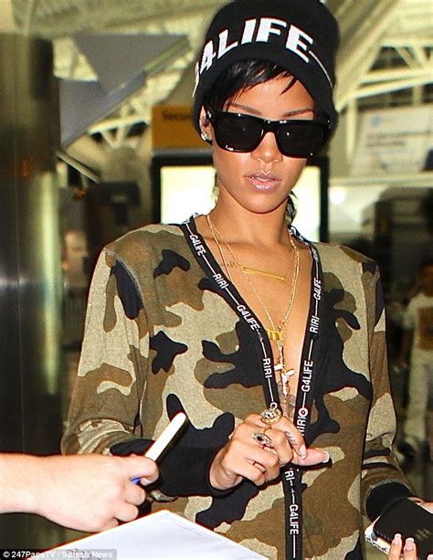 Rihanna Covers Up For Once In Her Onesie But Can T Help But Stand Out