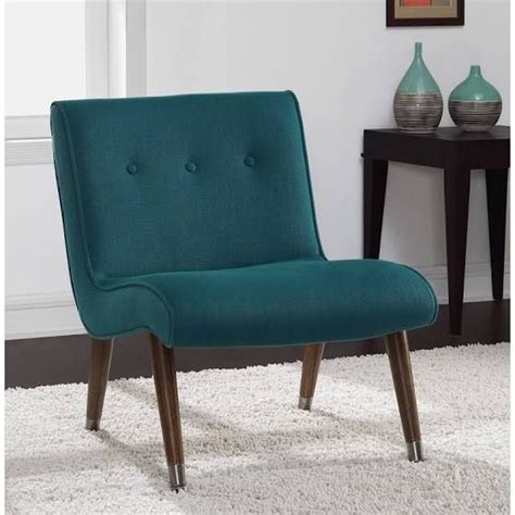 This modern armless chair gives a contemporary feel to your living area or bedroom. teal chair | Armless chair, Mid century modern accent chairs