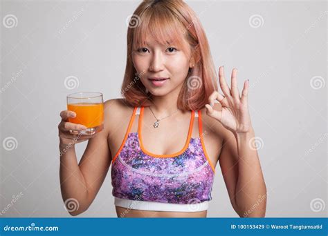 Beautiful Asian Healthy Girl Drinking Orange Juice Show Ok Sign Stock Image Image Of Juice