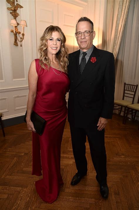 lady in red tom hanks enjoys sweet moment with glamorous wife rita wilson starts at 60