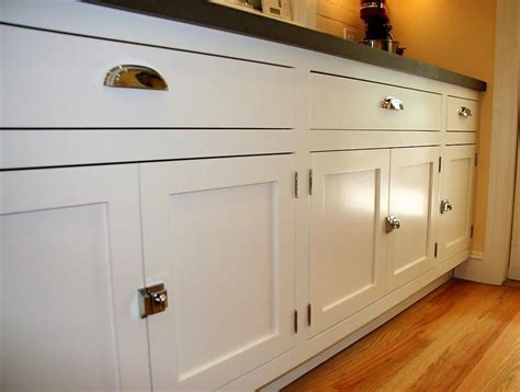 Glass doors are a prominent feature of this cabinet style, giving you the perfect opportunity to display your pots, pans, and antique décor. base cabinet idea for kitchen | White kitchen cabinet doors, White ikea kitchen, Shaker style ...