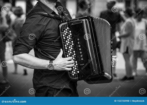 Hands Of Accordionist Playing Accordion In The Street Editorial Image