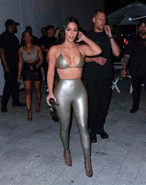 Kim Kardashian Stepped Out In A Silver Bikini Top And Matching Skintight Pants