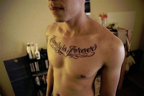 Having a script tattoo is really beautiful way of easily getting your message across. Pin by mary hawk on tattoo ideas | Chest tattoo men ...