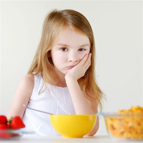 Little Girl Eating Cereal With Milk Stock Image Image Of Female