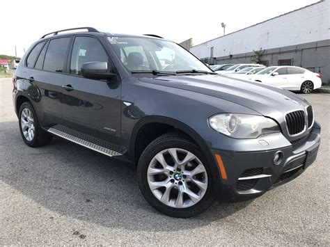 Speedometer, odometer, engine coolant temp, tachometer, trip odometer and trip computer. Pre-Owned 2011 BMW X5 xDrive35i 4D Sport Utility in Richmond Hill #078404T | Queens Auto Mall
