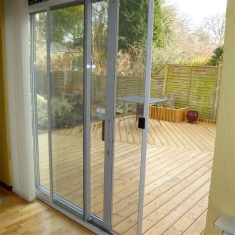 However, fitting them can be tricky building your own diy sliding door is not the easiest challenge you can take on, but it's far from impossible, especially if you have the right plan to follow. Sliding Fly Screen for Patio Doors (DIY Kit) | Streme