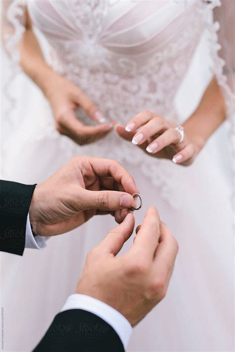 Wedding Ceremony Exchange Of Rings Del Colaborador De Stocksy