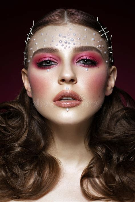 Beautiful Girl With Perfect Art Makeup And Pearl Beads
