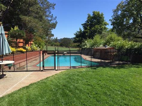 The top of the enclosure must be 60 inches above grade and can not have an opening of more than four inches. Blackhawk Pool Fence - Baby Barrier® Pool Fence of San Jose