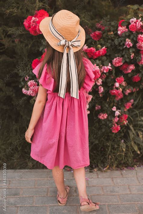 Cute Child Girl 5 6 Year Old Wear Straw Hat With Bow And Summer Dress