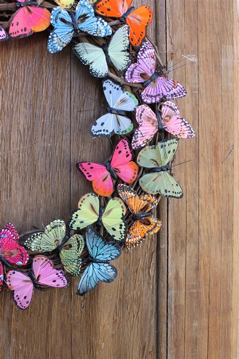 12 beautiful decorations to hang on your door that aren't wreaths. Spring Wreath, Butterfly Wreath, Butterfly, Summer Wreath ...