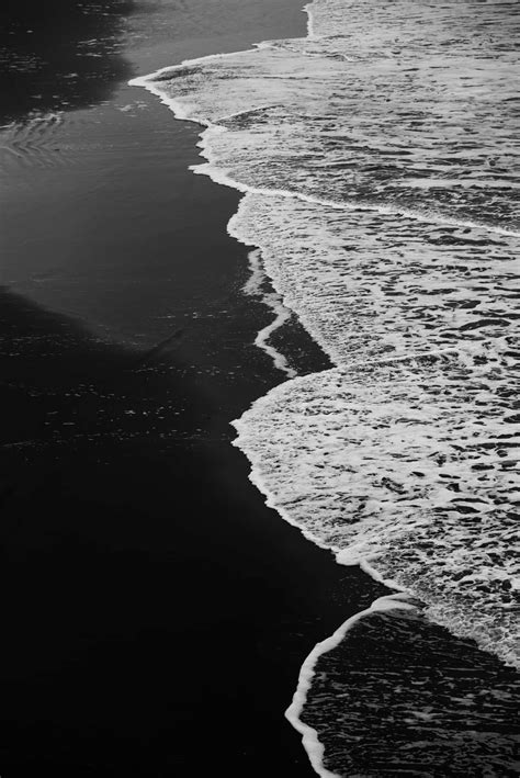 Download Tranquil Black And White Beach Wallpaper