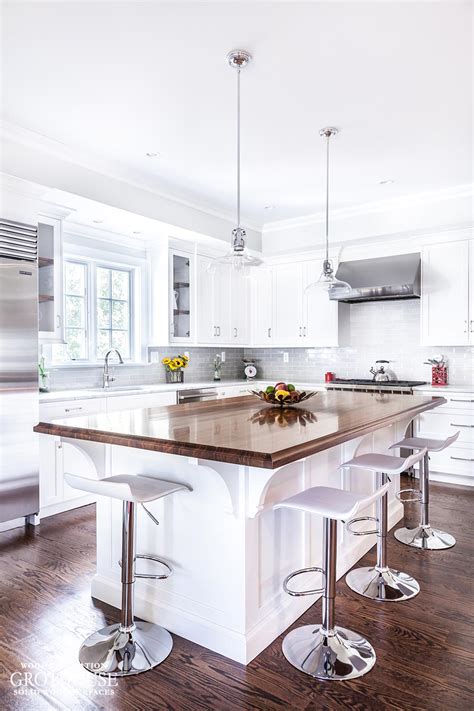 Your wood countertop produced by grothouse can be crafted with a wide variety of additional options that allow you to make your wood countertop both. Walnut Countertop with White Cabinetry in Madison, NJ