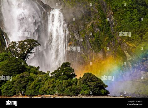 Lush Rainforest And Thundering Bowen Waterfall Landscape At Mouth Of