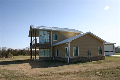 The kit price + material costs + labor costs. Aspen with modifications. Handsome utilization of red-iron ...