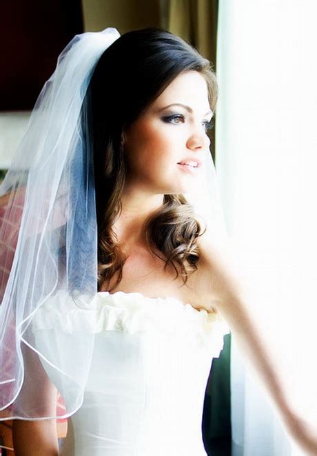 An updo, a side updo, hair down or anything else that you love. Wedding hair half up half down with veil