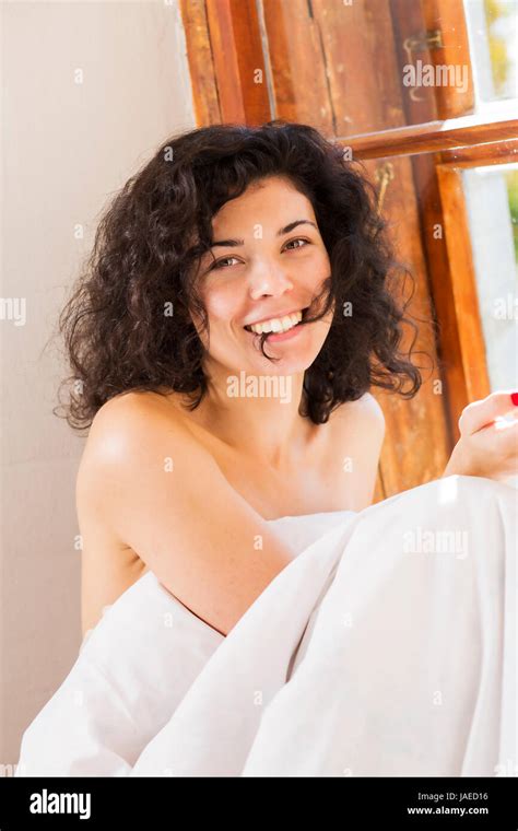 Smiling Pretty Woman Under Blanket Bite Hair Perm Stock Photo Alamy