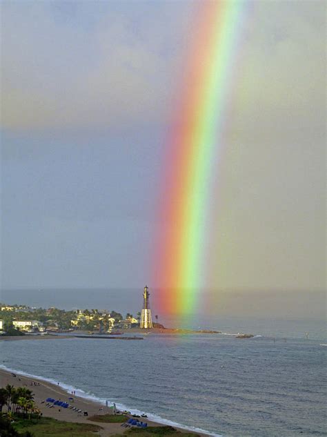 Very Bold Rainbow At Hillsboro Lighthouse In Florida Photograph By