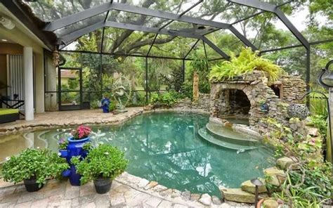 Tropical Swimming Pool With Indoor Pool Exterior Stone