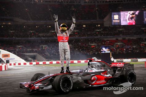 Relive the incredible final race of the 2008 season with all. Lewis Hamilton stands on top of his McLaren Mercedes F1 ...