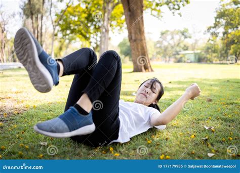 Asian Child Girl Falling Down Or Slipping On The Groundinjuring Her