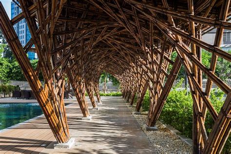 The Walkway Is Lined With Bamboo Poles