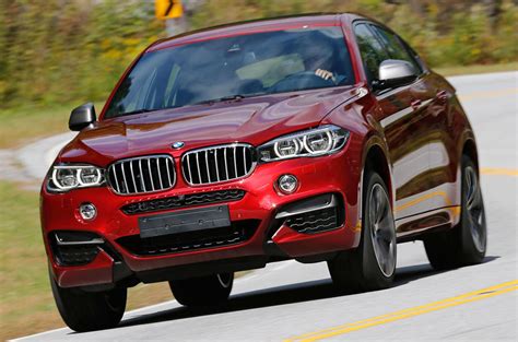 The x6 was marketed as a sports activity coupé (sac) by bmw, referencing its sloping rear roof design. BMW X6 M50d first drive