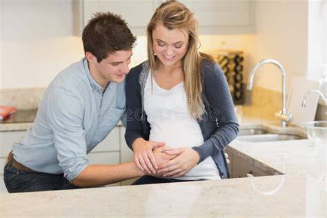 Man Touching Partners Pregnant Belly Stock Image Image Of Indoors