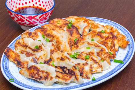 Gyoza are small japanese dumplings which have been filled with ingredients like minced pork and vegetables. Classic Pork Gyoza | Asian Inspirations