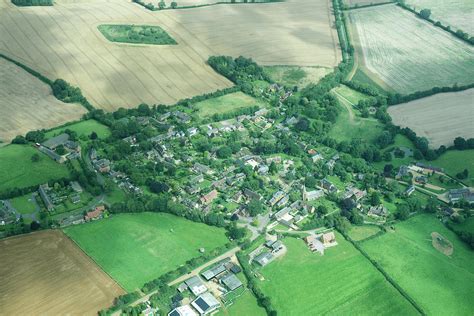Aerial View Of Rural Town And Fields Photograph By Peter Muller Pixels