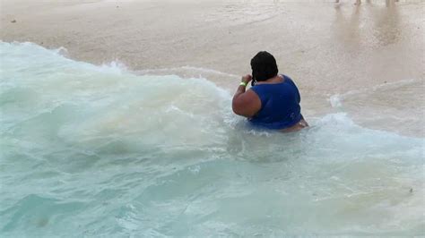 woman stuck in jamaican waves jukin licensing