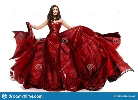 Beautiful Woman In Red Dress Elegant Lady In Fluttering Sparkling Gown