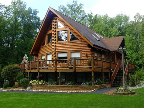 Distinctive Log Cabin With Wrap Around Porch — Randolph Indoor And