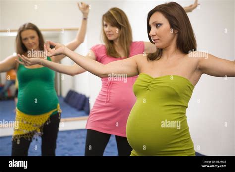 pregnant belly button dancer